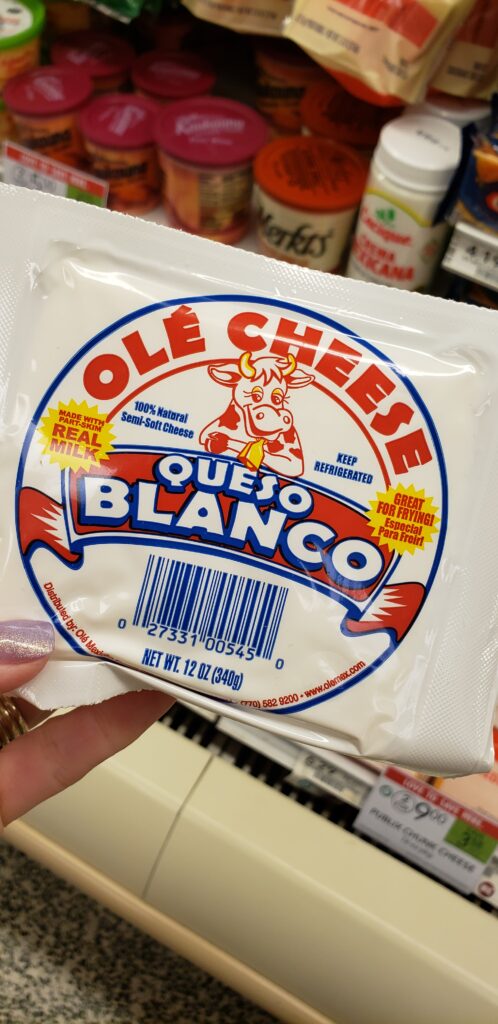 hand holding queso blanco