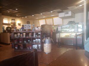 juice n java cafe cocoa beach florida - front counter with coffee for sale