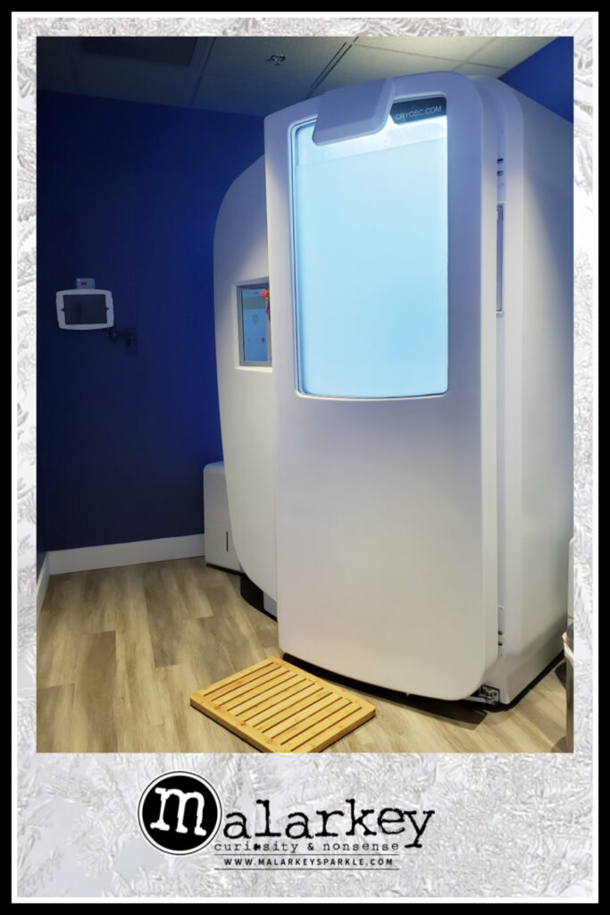 room with a cryo machine in it and matt on floor