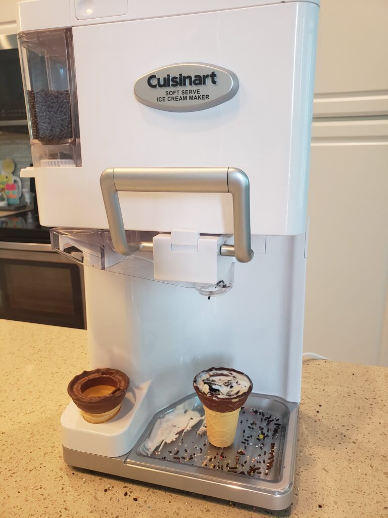 cuisinart ice cream machine with ice cream in a cone
