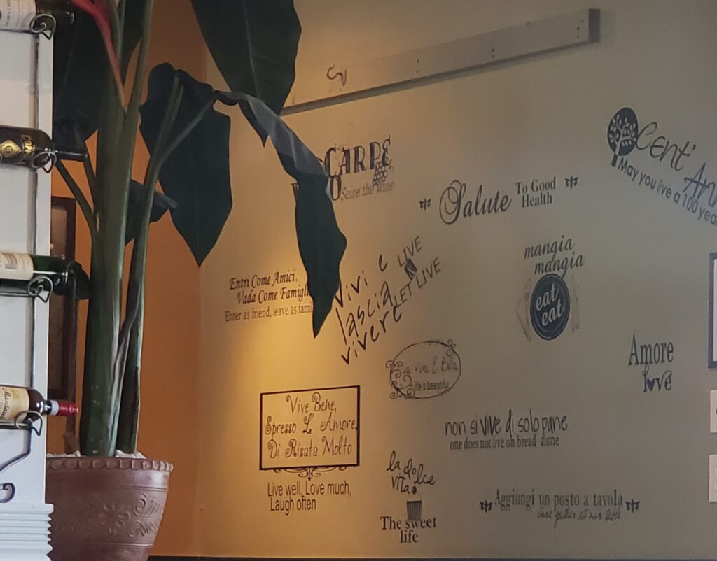 brano - wall of sayings in restaurant