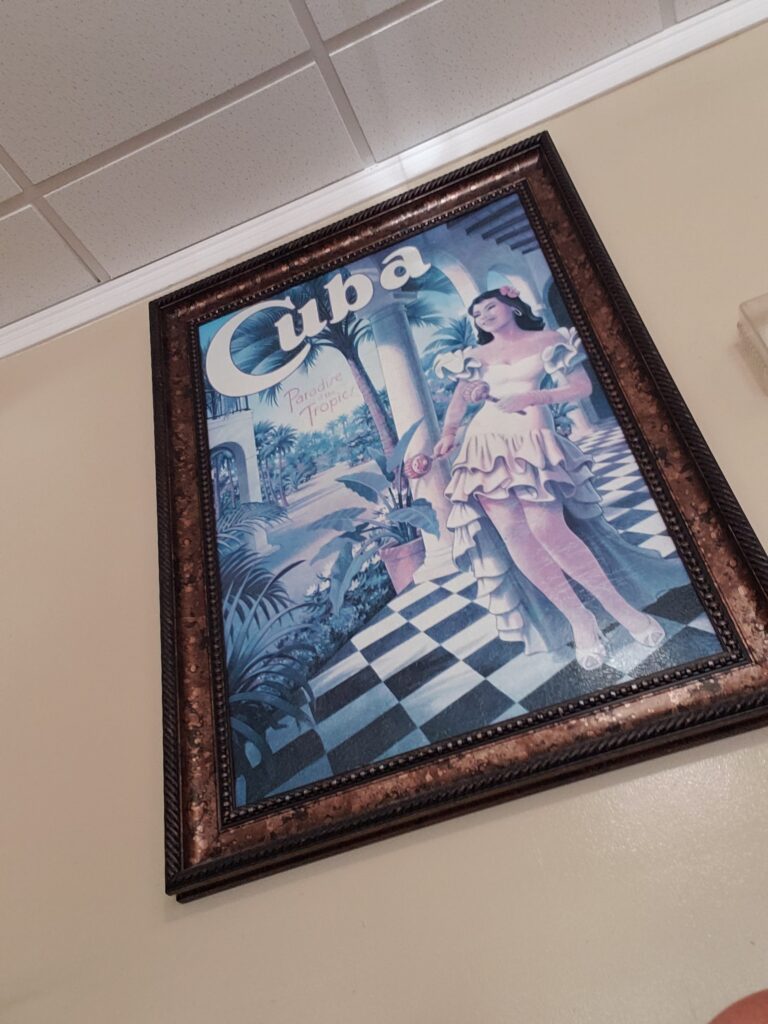 picture of a cuban woman framed with the word cuba above her head