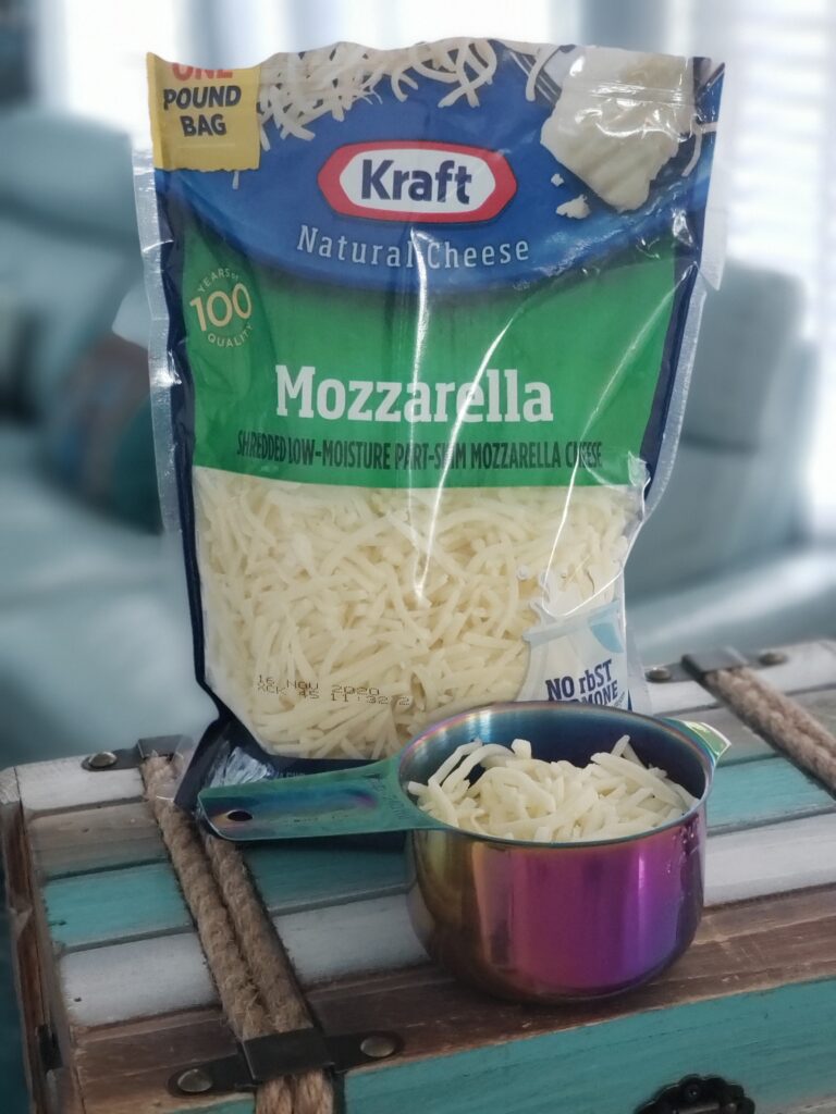 mozzarelle cheese and a measuring cup