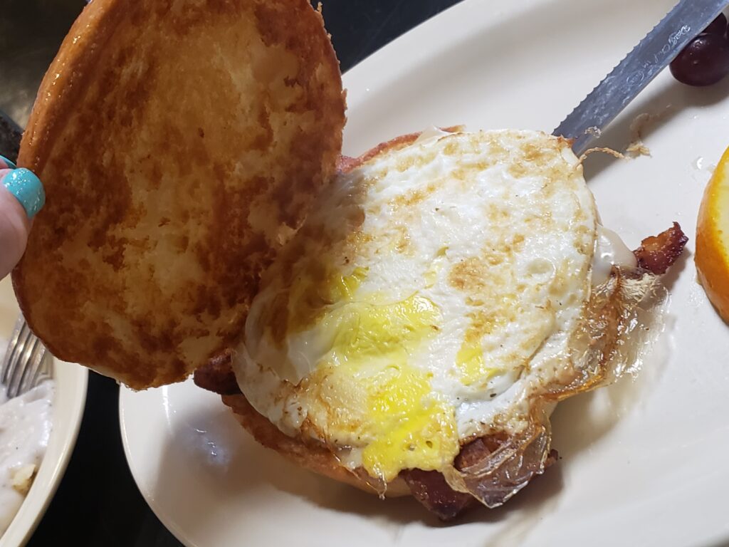 egg sandwich on a plate open