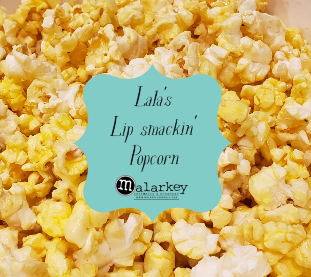 popcorn with ad for lala's lip smacking popcorn in the center