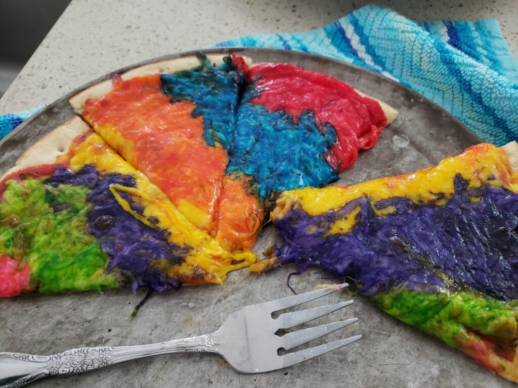 rainbow pizza - 7 colors baked and sliced