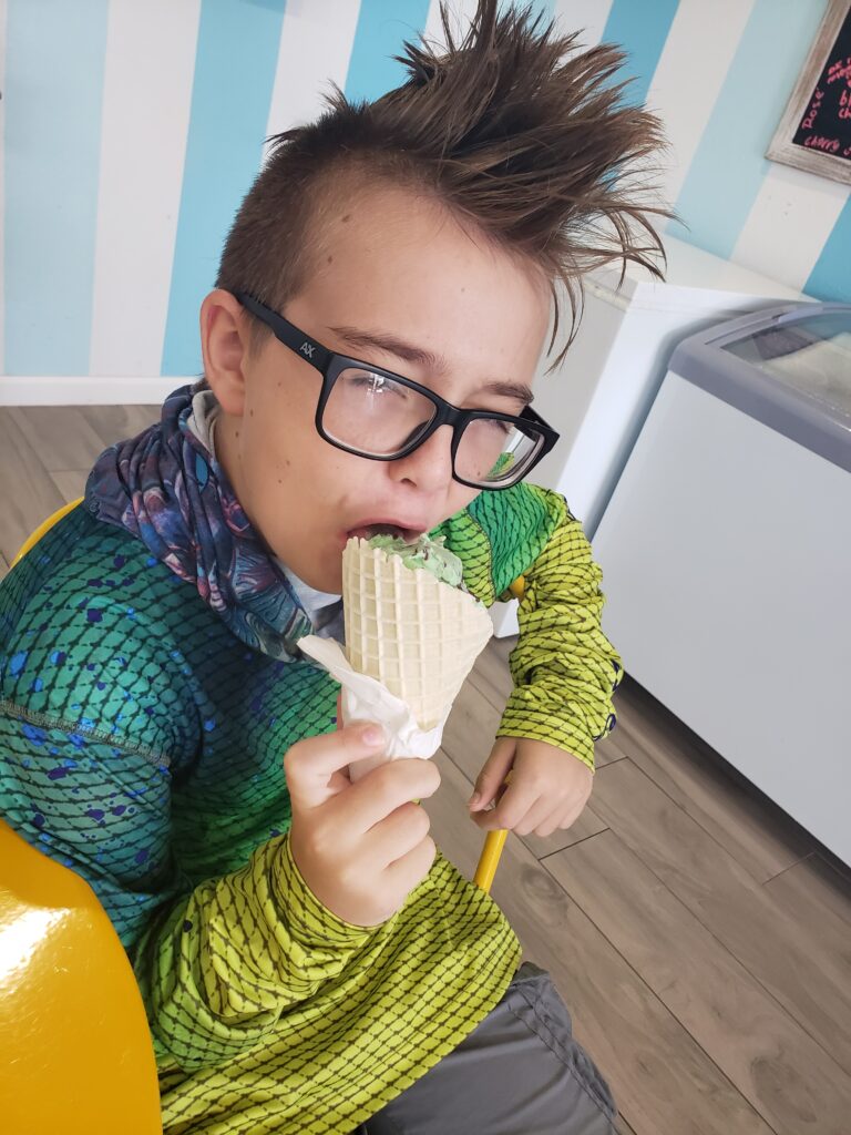 a boy eating icer cream
