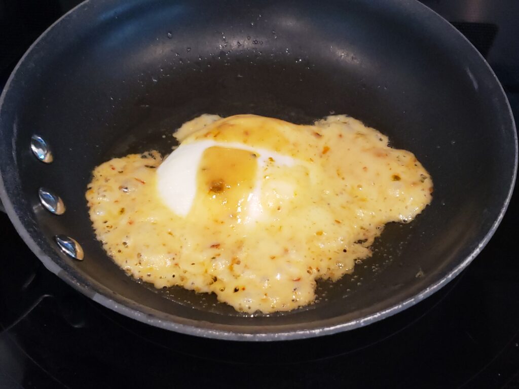 egg, toast, bacon on a plate