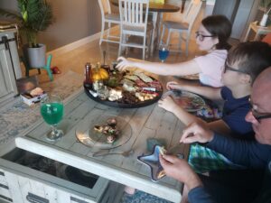 charcuterie board and family