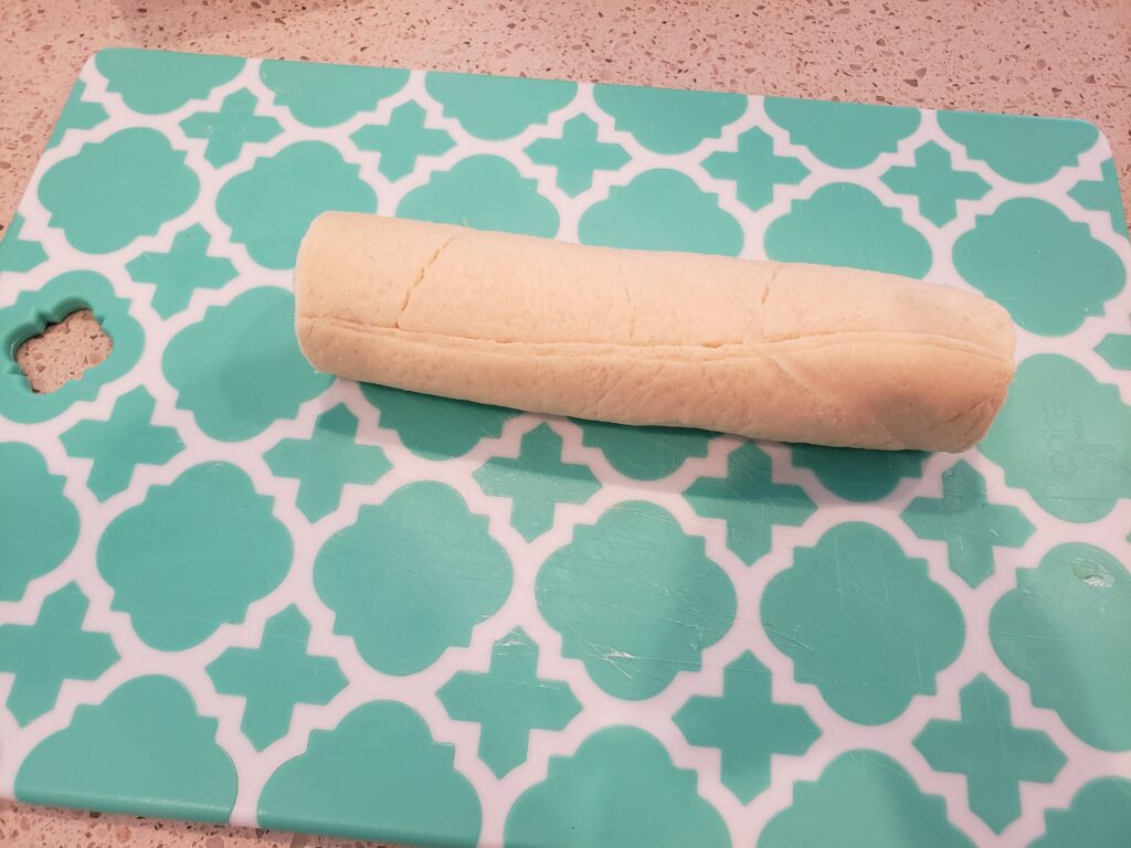 croissant roll flat on a cutting board