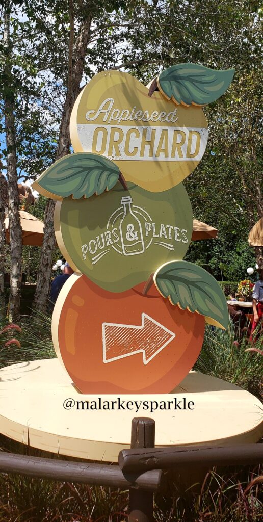 apple orchard sign at epcot