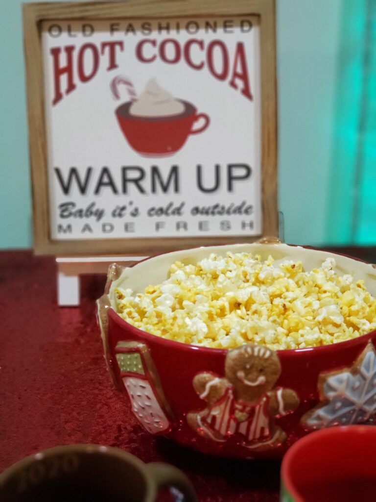 HOT COCOA CHARCUTERIE BOARD - popcorn and hot cocoa sign