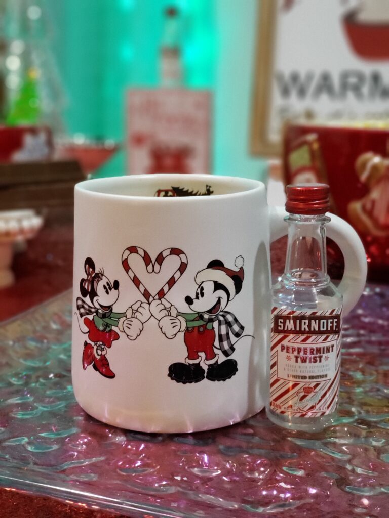 HOT COCOA CHARCUTERIE BOARD - mickey mouse and minnie with candy canes making a heart