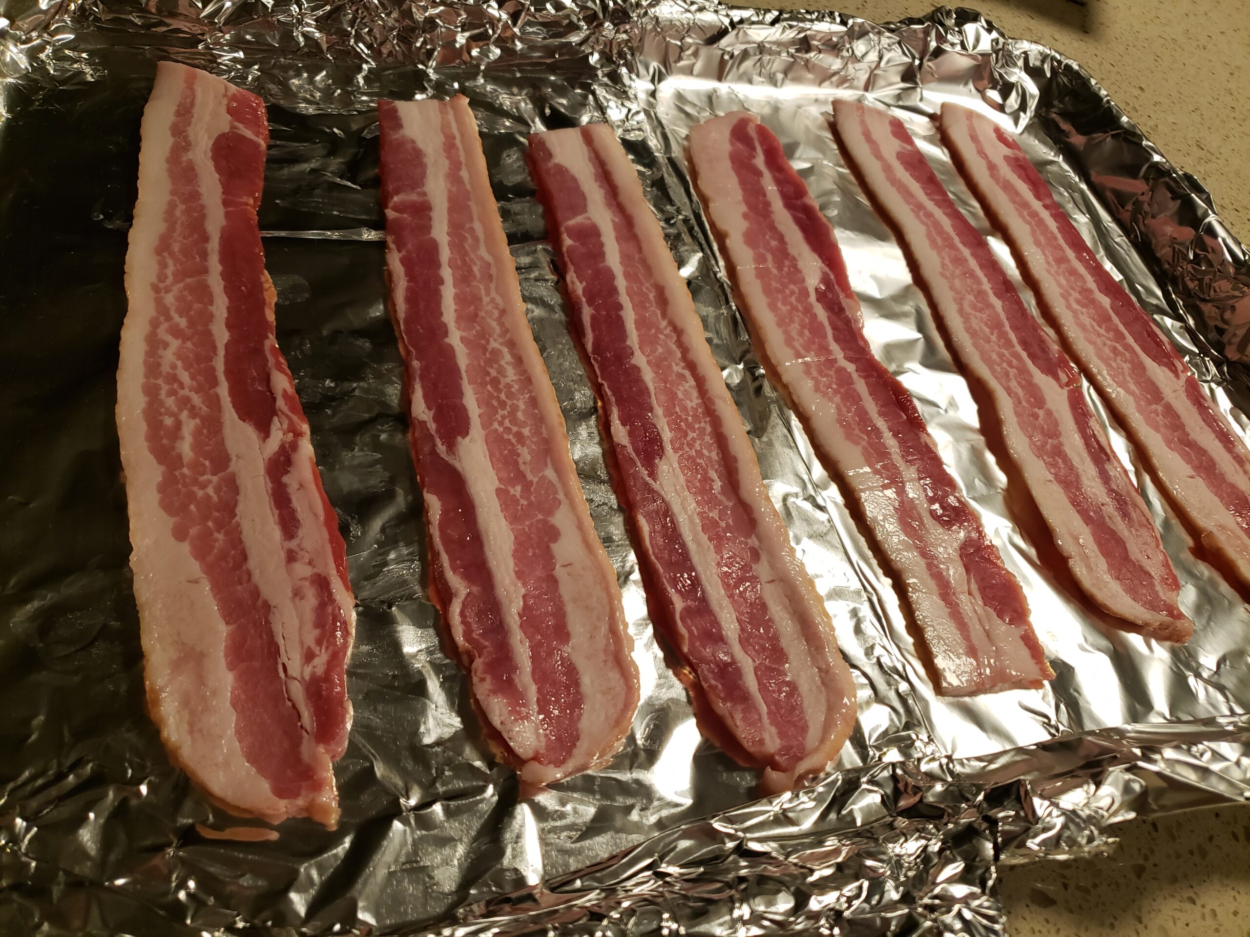 bacon on tinfoil in the oven