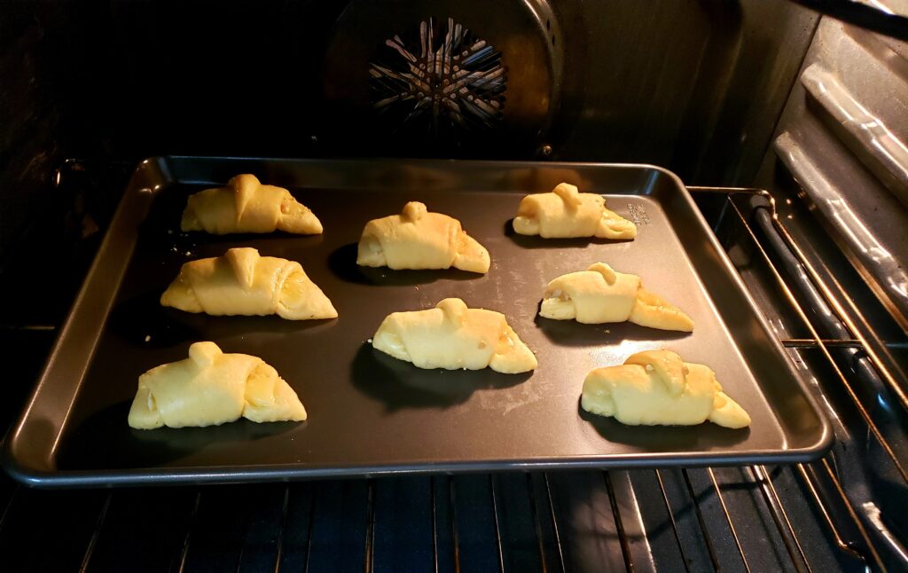 crescent roll on a pan in the oven
