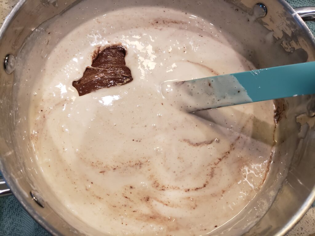 stirring the fluff for the fudge