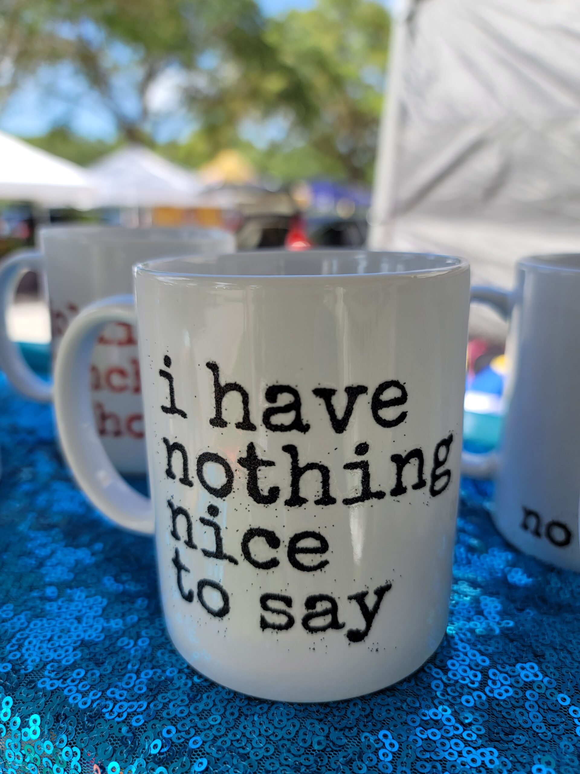 malarkey's first vendor fair exposed - i have nothing nice to say - coffee cup