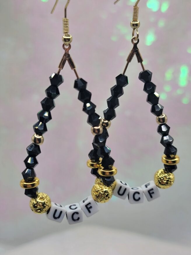 UCF gold dangle tear drop earrings