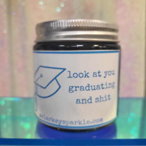 look at you graduating and shit candle