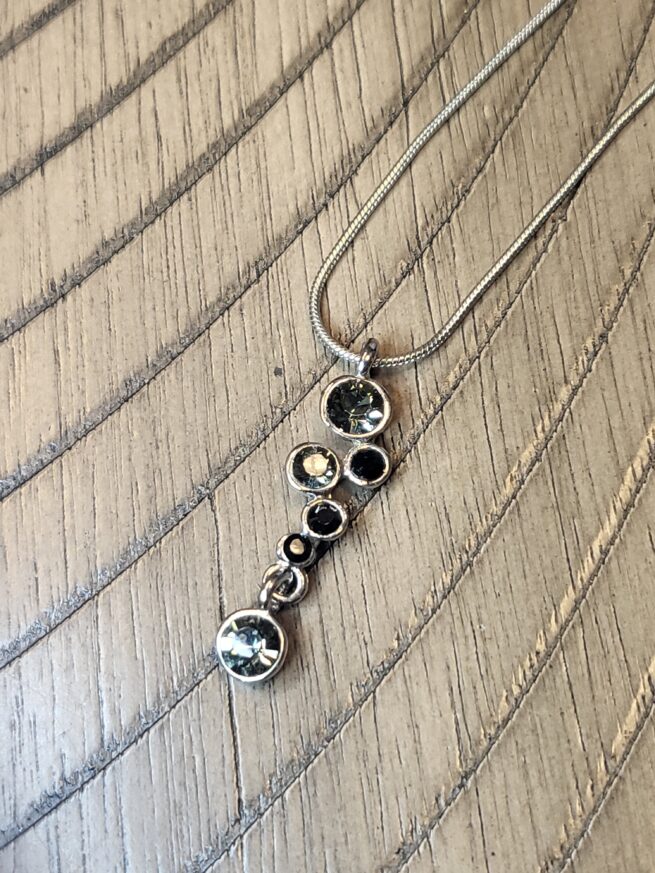 black and clear crystals on silver chain - nicer nonsense