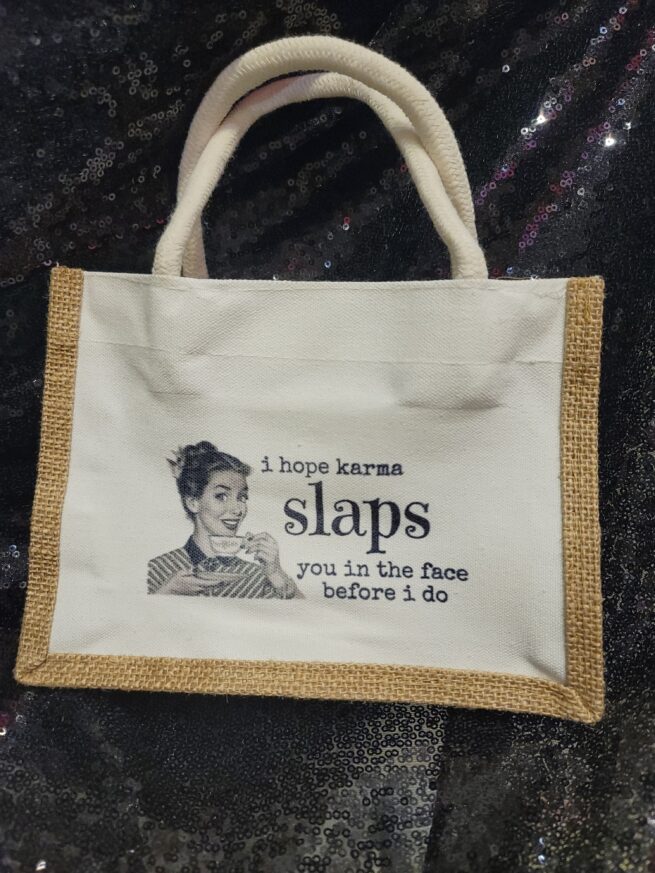karma slaps you in thr face mini tote bag