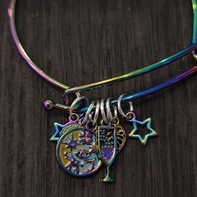 rainbow metal bracelet - good fortune themed