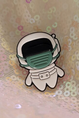 astronaut with mask on pin