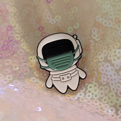 astronaut with mask on pin