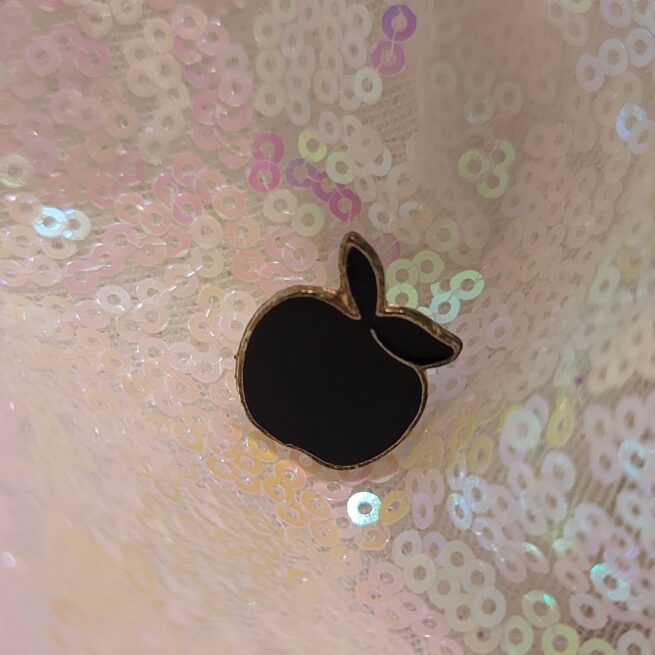 black apple pin