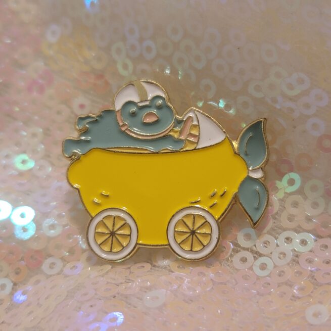 frog driving a lemon car pin